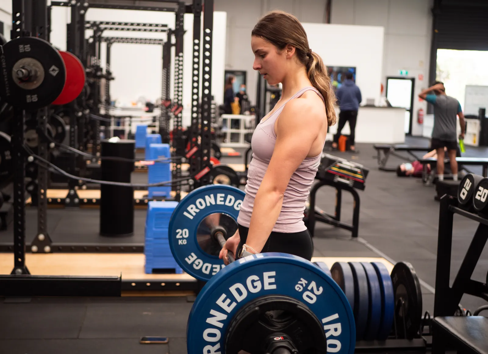 Core Advantage athlete setting up for a barbell deadlift